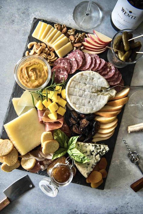 HOW TO BUILD A CHEESE BOARD TO ENHANCE YOUR WINE Wine Appetizers, Cheese And Wine, Last Friday Night, Charcuterie Inspiration, Wine Pairings, Charcuterie Platter, Charcuterie Cheese, Cheese Party, Snack Board