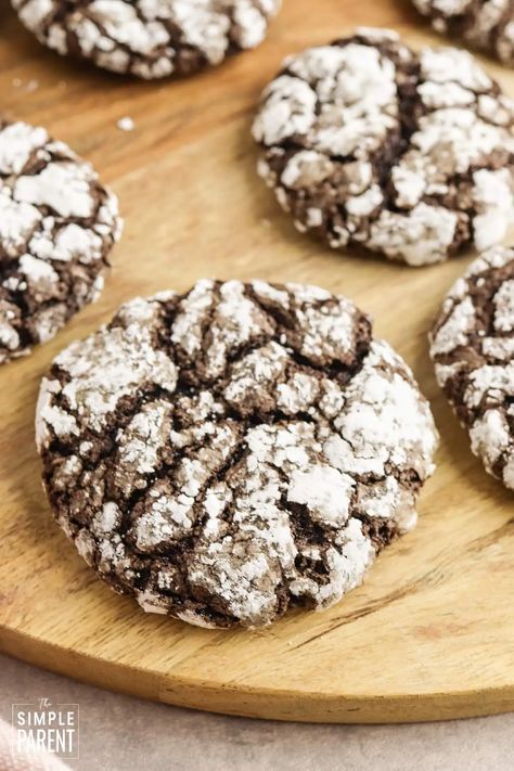 Chocolate Cool Whip Cookies • The Simple Parent Chocolate Cool Whip, Chocolate Crackle Cookies, Cool Whip Cookies, Chocolate Puff, Cool Whip Desserts, Crackle Cookies, Chocolate Crackles, Chocolate Crinkle, Amazing Cookies