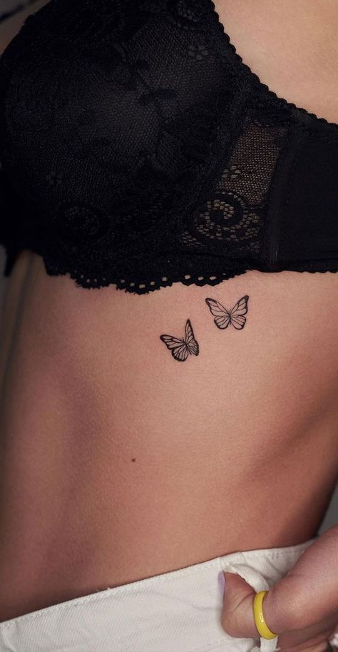 75 Unique Small Tattoo Designs & Ideas : Two Butterflies I Take You | Wedding Readings | Wedding Ideas | Wedding Dresses | Wedding Theme Rib Tattoo Minimalist, Butterfly Tattoo Rib Cage, Butterfly Underboob Tattoo, Butterfly Tattoo Under Breast, Sa Tattoo Ideas, Butterfly Rib Tattoo, Tato Grunge, Tato Geisha, Hidden Tattoo