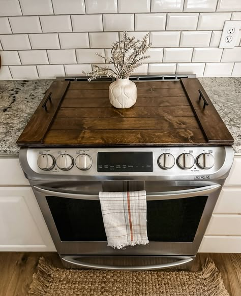 Items ordered AFTER 12/6/2023 ---MAY--- NOT--- ARRIVE--- by Christmas. 🔨If you need a custom size email us here ~ hello@josephinethomashome.com and include pics of your stove with a tape measure. We are happy to help! We are a small family-owned business and have our own website at josephinethomashome.com Stop in! Our handmade noodle boards are the perfect way to make better use of your stovetop. Although not food grade, these are definitely décor-grade :-) Use them to clean up the look of your stovetop or hold often-used spices or décor. This noodle board is stained in warm brown stain with a clear coat and laser carved to resemble individual slats.  Handles are added to each side. Measures: 30 x 22 x 1.5 inches 31 x 23 x 1.5 inches 37.5 x 23 x 1.5 inches Please measure your stovetop. 🖤 Stovetop Wooden Cover Diy, Electric Cooktop Cover, Glass Cooktop Cover, Simple Western Kitchen, Stove Makeover Diy, Stovetop Cover Wood, Stove Wood Cover, Kitchen Stuff Household Items, Stove Cover Ideas