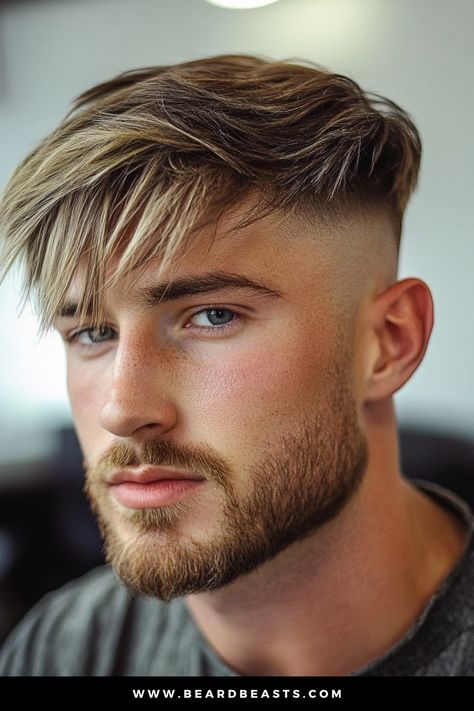 Close-up of a young man with a stylish Long Fringe High Fade, a standout look in the category of men's short on sides, long on top haircuts. The haircut features a long, textured fringe that sweeps across the forehead, paired with a sharp high fade on the sides for a striking contrast and modern appeal. Long Hair With Short Sides Men, Mens Fade Long On Top, Medium Hair Styles For Men, Teen Boy Haircut Long On Top, Short Sides Long Top Hair Men, Mens Haircut Long On Top, Fade Long On Top, Short Sides Haircut, Teen Boy Haircut