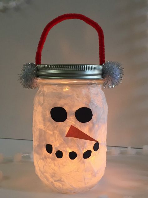 Simple snowman craft for kids. You probably have everything that you already need to make this DIY lantern snowman for your "glow loving" kids!  fun, glowing craft Snowman Jar Craft, Glass Jar Snowman Diy, Paper Lantern Snowman Diy, Snowman Luminaries, Diy Lanterns For Kids, Snowman Luminary Jar, Lantern Diy Ideas, Snowy Mason Jar Luminaries, Lantern Snowman