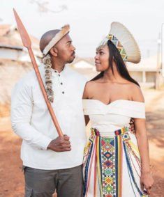 Ndebele Bride In Off Shoulder Wedding Dress With Isicholo Hat Ndebele Bride, Ndebele Wedding Dress, Ndebele Attire, Venda Traditional Dresses, Tsonga Traditional Dresses, Tswana Traditional Dresses, Xhosa Traditional Attire, Shoulder Wedding Dress, Traditional African Clothing