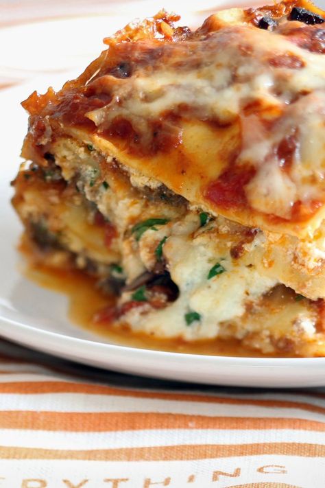 NYT Cooking: In 2001, Regina Schrambling went on a week long odyssey in search of the ultimate lasagna recipe. She tested several, and finally found her ideal in a mash-up of recipes from Giuliano Bugialli and Elodia Rigante, both Italian cookbook authors. <br/><br/>“If there were central casting for casseroles, this one deserved the leading role. But its beauty was more than cheese deep... American Lasagna, Ultimate Lasagna Recipe, Sausage Ricotta, Italian Sausage Lasagna, Lasagna Recipe With Ricotta, Italian Cookbook, Weekend Recipes, Marcella Hazan, Best Lasagna Recipe