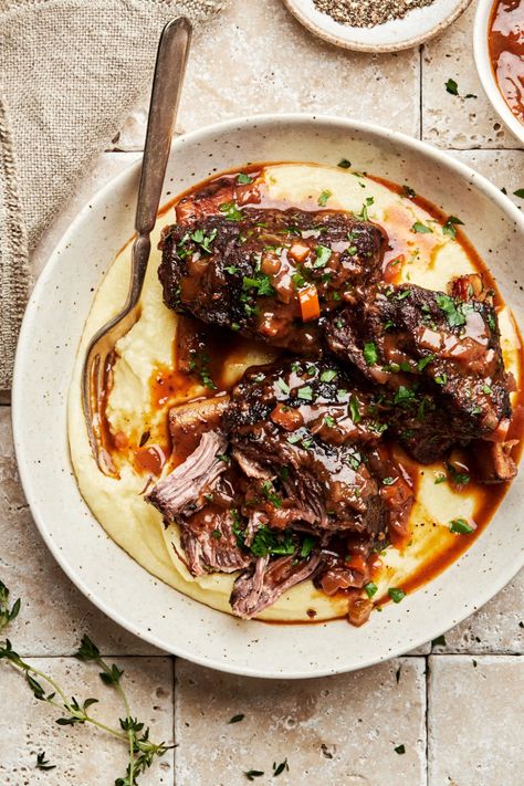 We’ve got you covered with this comforting and hearty short rib recipe so tender you won’t be able to stop yourself from devouring them all in one sitting. Recipes With Beef Short Ribs, Ribs Recipes Oven, Beef Short Ribs Slow Cooker, Beef Short Ribs Instant Pot, Short Ribs Recipes, Short Ribs Instant Pot, Sous Vide Recipes Beef, Best Short Rib Recipe, Ribs Recipes