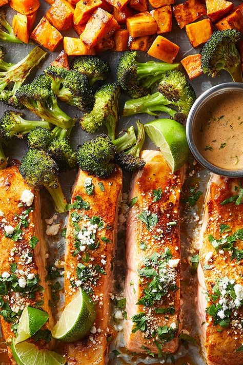 This Sheet Pan Salmon with Sweetpotatoes and Broccoli is easy-to-make and bursting with flavor and good-for-you nutrition. We❤️ it! Thank you Eating Well Magazine! #sweetpotato #salmon #sheetpandinner Sheet Pan Dinners Broccoli, Eating Well Sheet Pan Recipes, Salmon Sweet Potato Sheet Pan, Salmon Sweet Potato Broccoli, Sheet Pan Salmon Broccoli And Potatoes, Salmon Sheet Pan Dinner Sweet Potato, Lemon Roasted Salmon With Sweet Potatoes And Broccoli, One Sheet Pan Salmon And Veggies, Sheetpan Salmon And Broccoli