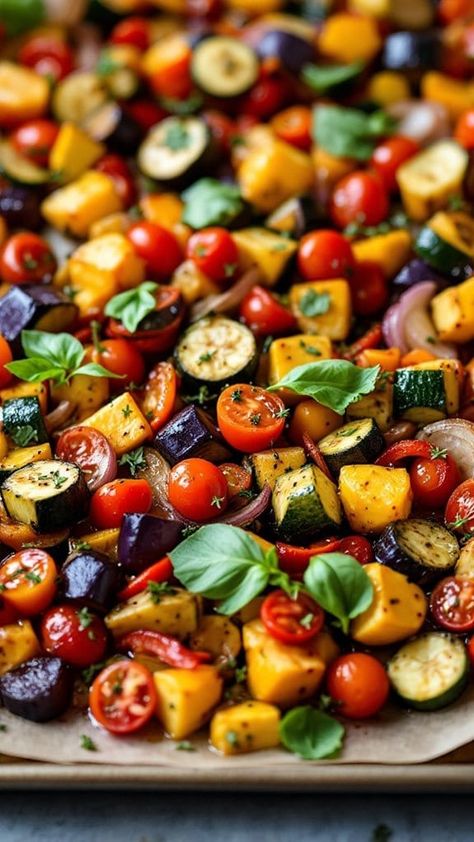 Looking for a simple and flavorful dinner idea? Try our sheet pan ratatouille with fresh herbs, a delightful way to enjoy a variety of roasted vegetables! Sheet Pan Ratatouille, Vegetables Oven Roasted, Roasted Sheet Pan Veggies, Vegetable Sheet Pan Recipes, Roasted Veggies Sheet Pan, Sheet Pan Zucchini, Mediterranean Sheet Pan Dinners, Italian Roasted Vegetables, Herb Roasted Vegetables