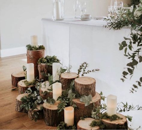 Simply logs, candles and foliage creates the most amazing woodland displays at Doxford Barns Wood Log Wedding Decor, Log Table Centre Pieces, Rustic Wedding Top Table, Forest Wedding Signs, Main Table Wedding Decoration, Muskoka Elopement, Woodland Display, Sweetheart Table Candles, Wood Centerpieces Wedding