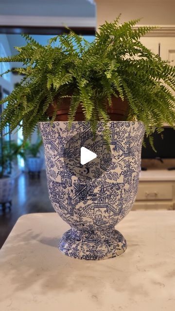 Pittypat’s Clothing Co. on Instagram: "We posted this little #diy project one year ago...and we were shocked and delighted at how much attention it got! These #Chinoiserie pots were easy and fun to make, and we have used them over and over again. Wendy originally created them to use for a pop-up shop, and since then they have graced her porch. The blue and white motif can be styled for all seasons, from Halloween to Easter and more. One of these pots was even used as a fabulous ice bucket for beverages during a tailgate!   #modpodge #decoupage #blueandwhite #preppy #chinoiseriechic #grandmillennial #lovepittypats #loveyourlook" Diy Chinoiserie Planter, Diy Chinoiserie Vase, White Christmas Decorations Diy, Decoupage Pots, Diy Chinoiserie, Cardigan Tutorial, Chinoiserie Planter, Country Colonial, Chinoiserie Christmas