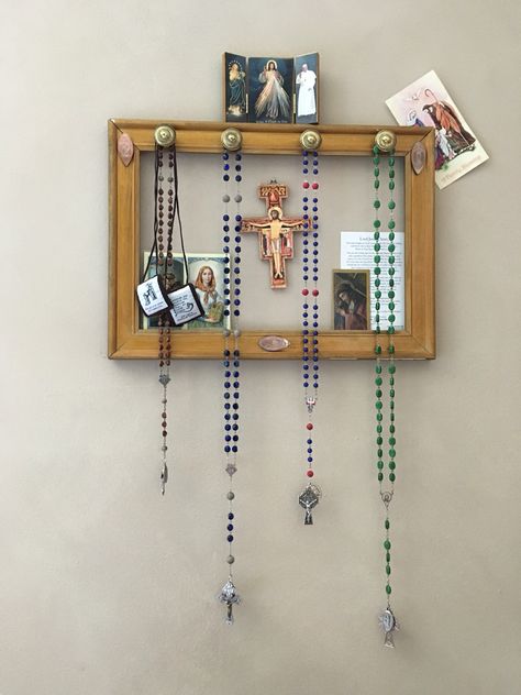 Home altar and rosary hanger made from an old picture frame and some drawer pulls.  #Catholic #Rosary Rosary Holder Diy, Rosary Hanger Diy, Rosary Decor, Rosary Hanger, Rosary Holder, Home Altar Catholic, Family Altar, Faith Crafts, Catholic Altar