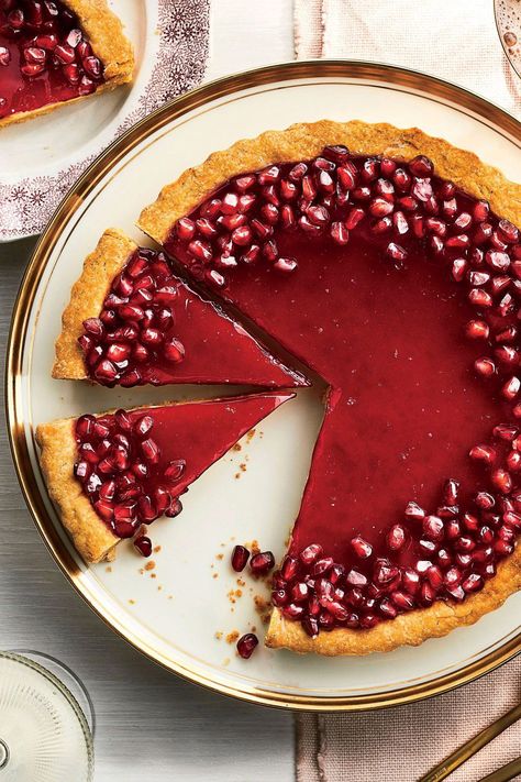 The classic chess tart gets a modern and elegant makeover with a halo of pomegranate seeds #dessert #pie #chesspie #pomegranate #fall #thanksgiving #southernliving Beautiful Tarts, Pomegranate Cheesecake, Tart Recipes Savory, Cheesecake Tart, Eating Seasonally, Ricotta Cheesecake, Cheesecake Tarts, Chess Pie, Stepford Wife