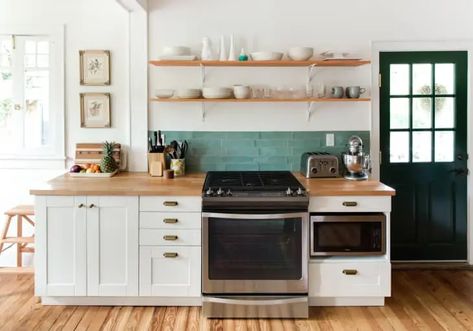 The Struggles of Space Saving for a Tiny Kitchen Design - Best Online Cabinets Beadboard Kitchen Cabinets, Beadboard Kitchen, Craftsman Style Bungalow, Upper Kitchen Cabinets, Rental Kitchen, Bungalow Renovation, Kabinet Dapur, Herringbone Backsplash, Open Kitchen Shelves