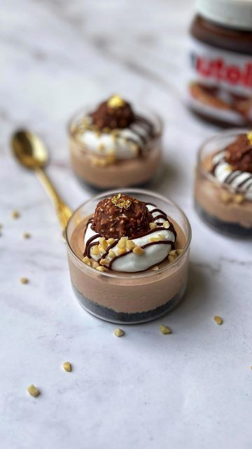 Aditi Goyal | Adilicious on Instagram: "NUTELLA MOUSSE CUPS - 3 ingredients super quick and so easy to make perfect dessert for any party Recipe 5-6 oreo 50grams Nutella 100grams Whipped Cream + more for garnish 🪩 Cursh oreos ans add to bottom of serving bowl/glass 🪩 Whip cream to medium peaks and mix nutella into it 🪩 Pipe it on the oreo layer and level it out 🪩 Garnish with some more whipped cream, nutella drizzle, chopped hazelnut and a ferrero rocher or as desired Save this recipe and t Nutella Mousse Cups, Nutella Mousse Recipe, Nutella Deserts, Nutella Drizzle, Nutella Mousse, Caramel Mousse, Mousse Cups, New Year's Desserts, Dessert Shooters