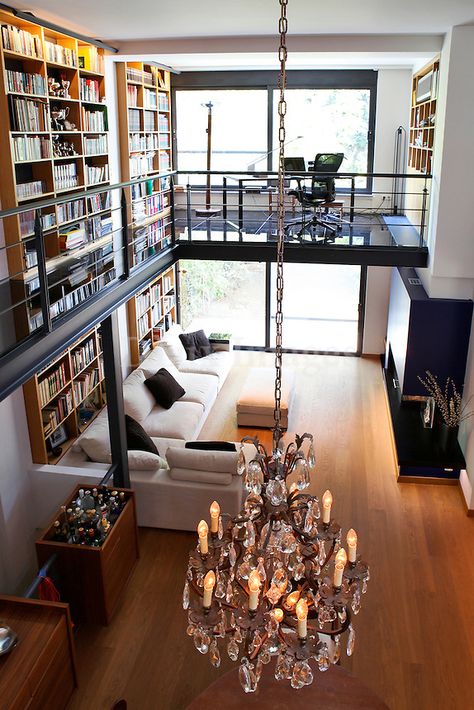 modern contemporary living room with mezzanine..This modern maisonette is built in the oldest northern suburb of Palaio Psychiko in Athens, Greece. Located among the residential architecture of the 20th century, the maisonette combines antique furniture with industrial design and trends of a modern lifestyle. Living Room With Mezzanine, Modern Contemporary Living, Industrial Lighting Design, Modern Contemporary Living Room, Home Library Design, Home Libraries, Loft Design, Hotel Decor, Trendy Home