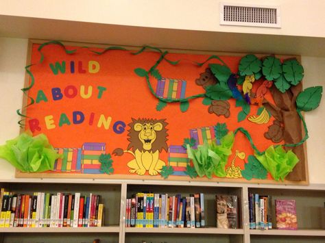 Wild About Reading! Fun kids area display Wild About Reading Display, Jungle Library, Wild About Reading, High School Decor, Book Bulletin Board, Reading Display, Vbs Decorations, Classroom Decor High School, Classroom Doors