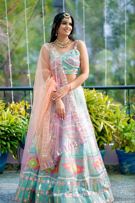 The theme of Mehandi was Pastels and what better way to rock the pastel theme than incorporating all different shades in one lehanga? I loved this outfit with and without dupatta as it has both traditional and western vibe. With hair, I went with simple back flower tie as I wanted a very chill and fun look. Pastel Colour Traditional Outfit, Mehandi Bridal, Shadow Puppets With Hands, Mehandi Outfits, Pastel Theme, Flower Tie, Bridal Outfit, Shadow Puppets, Ethnic Outfits