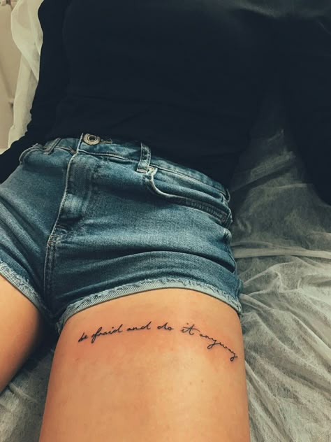 Thigh Word Tattoos For Women, Cursive Leg Tattoo, Small Matching Country Tattoos, Writing Tattoo On Thigh, Thigh Writting Tattoo, Quote Tattoos For Women Thigh, Tattoo Thigh Quote, Script Thigh Tattoo Women, You Are Exactly Where You Need To Be Tattoo