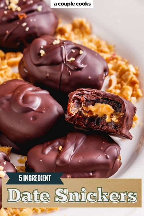 These 5 Ingredients Date Snickers are a healthier twist on the classic candy bar! Made with Medjool dates, peanut butter, peanuts, and chocolate, these gluten-free, dairy-free treats are perfect for snacking all week. Pop over to our site for the recipe! Chocolate Date Cookies, Easy Recipes With Dates, Date Candy Bars, Recipe Using Dates, Fresh Dates Recipe, Snicker Dates Recipe, Date Snickers Bars, Dates Recipes Healthy, Date Dessert Recipes