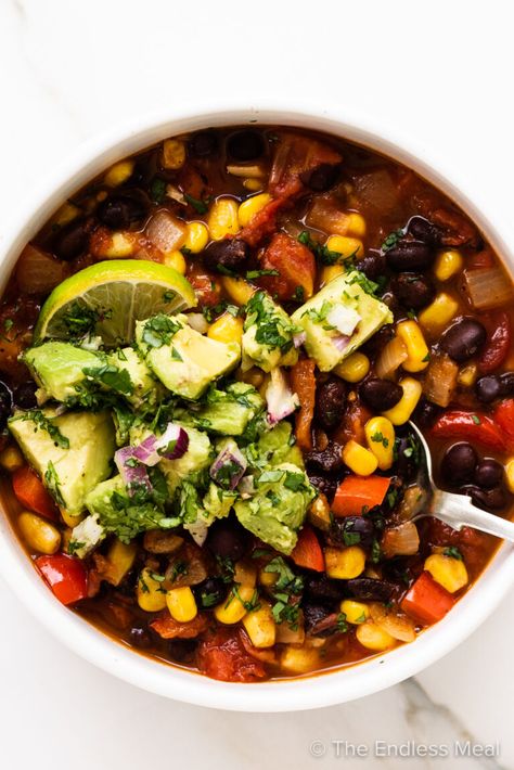 This black bean and corn chili is hearty, flavorful, and easy to make vegetarian. You'll want to soak up the rich tomato broth that's made by using salsa in place of some of the tomatoes. It really is the ultimate one-pot meal, and it's ready in just 30 minutes! #theendlessmeal #chili #blackbeancornchili #blackbeanchili #veganchili #vegetarianchili #vegetablechili #healthychili #easydinnerrecipe #soup #glutenfree #blackbeans #blackbeanchili #cornchili #healthyrecipes #chilirecipes Chili Stuffed Peppers, Easy Vegetarian Chili Recipe, Salsa Chili, Corn Chili, Vegetarian Chili Easy, Black Bean And Corn, Favorite Chili Recipe, Vegetable Chili, Healthy Chili