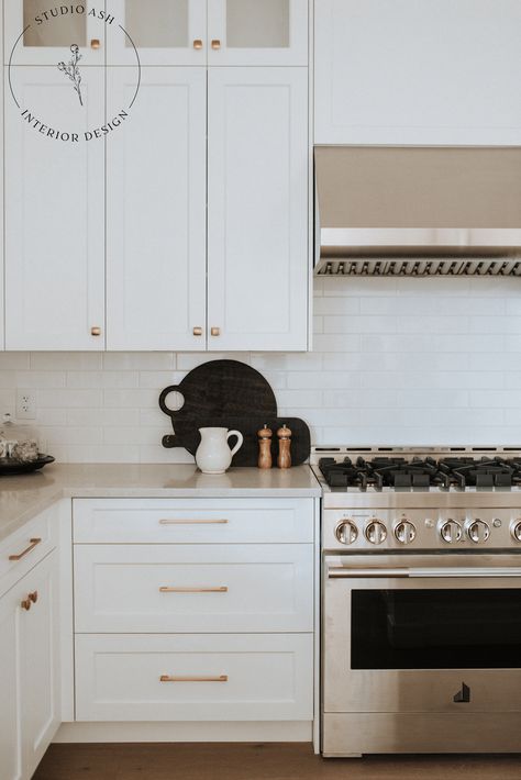 Silver And Gold Kitchen Hardware, White Kitchen Gold Hardware, White Kitchen Cabinets With Quartz, Apartment Refresh, Gold Kitchen Hardware, White Cabinets White Countertops, Kitchen Dining Room Combo, Grey Counter, White Shaker Kitchen Cabinets