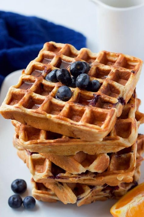 Whole wheat blueberry waffles with an orange maple syrup - a great easy breakfast or brunch recipe! Making Waffles, Whole Wheat Waffles, Kitchen Hacks Food, Blueberry Waffles, Banana Waffles, Cake Snack, Fluffy Waffles, Wild Rumpus, Food On The Table