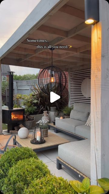 Rebecca Riley | Interior & Garden on Instagram: "Sometimes, all you need is peace and quiet with the crackling of a stove 🔥🌿 

Contains previous pr products

Dorma Outdoor Mirror - @perchandparrow 
Bar Set - @supremoleisure part of the Mirfield outdoor furniture range
Pebble Mood Light & festoon lighting @solarcentre
Garden chiminea @vesta_stoves_uk 
Evora Chaise & Kate lanterns - @suns.lifestyle 
Fennel stake lights - @sparklelighting 
Basket planters - @thebasketcompany 
Wild Daisy wreath - @homemadehandmade65 

#pergola #pergolas #outdoorlighting #nightgarden #gardenbar #gardenfurniture #gardendesign #gardeninspiration #outdoorliving #gardenpatio #countryhome #gardeninspo #summergarden #newbuildgarden #rusticdecor #gardenuk #backyarddesign #backyardgarden #gardensofengland" Pergola Decorating Ideas, Gazebo Lighting, Garden Sitting Areas, Outside Seating Area, Screened Porch Designs, Wild Daisy, Daisy Wreath, Backyard Gazebo, Pergola Garden