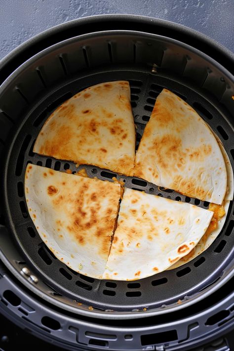 These air fryer quesadillas couldn't be any easier! In just 8 minutes, you'll have golden, crisp tortillas filled with gooey melted cheese for a meal everyone will love. Air Fryer Cheese Quesadilla, Corn Tortilla Quesadilla, Air Fryer Quesadilla, Airfryer Quesadilla, Greek Yogurt Guacamole, Chicken Batter, Large Air Fryer, Fried Beans, Cheese Quesadilla