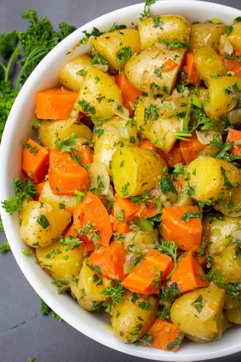 Buttery, herby, garlicky, oniony potatoes and carrots. The instant pot does a great job with this easy comfort food side dish. Not fancy. Just delish. Instant Pot Potatoes And Carrots Only, Cabbage Carrots And Potatoes Instant Pot, Potato And Carrot Recipes Slow Cooker, Boiled Carrots And Potatoes, Potatoes And Carrots In Instant Pot, Instant Pot Potatoes And Carrots, Carrot And Potato Recipes, Instant Pot Sides, Instant Pot Potato Recipes