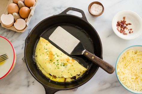 omelette ("These are my favorite omelette fillings: raw-milk sharp cheddar cheese, bacon or sausage; sautéed onions, mushrooms, and red bell peppers") #breakfast #health