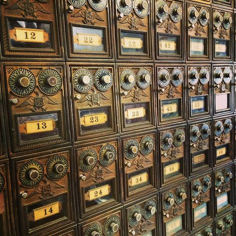 Vintage Post Office Boxes | Content in a Cottage Shades of the past! Vintage Post Office Boxes, Post Office Interior, Post Office Design, Whiskey Neat, Vintage Office Supplies, Vintage Mailbox, Old Post Office, Mail Boxes, Apothecary Cabinet