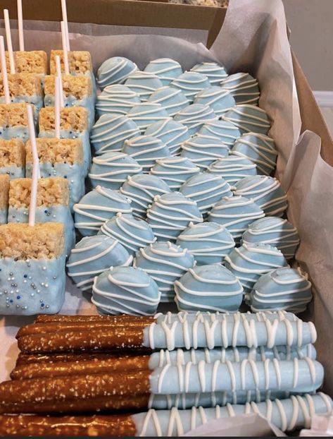 Light Blue Dessert Table Ideas, Baby Shower Desert Ideas For Boy, Babyshower Treat Table, Baby Its Cold Outside Baby Shower Ideas Blue, Baby Shower Boy Dessert Table, Baby Shower Rice Krispie Treats Boy, Winter Wonderland Treats Dessert Tables, Blue Christmas Baby Shower Ideas, Baby Boy Dessert Table