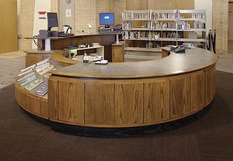 A round circulation and reference desk, at the center of the library  http://www.demcointeriors.com/index.php?option=com_content&view=article&id=276:technolink-modular&catid=55:products-circ&Itemid=62 Low Desk, Front Desk Design, Doctor Office Design, School Library Design, Atrium Design, Library Desk, Future Library, Library Reference, Service Desk