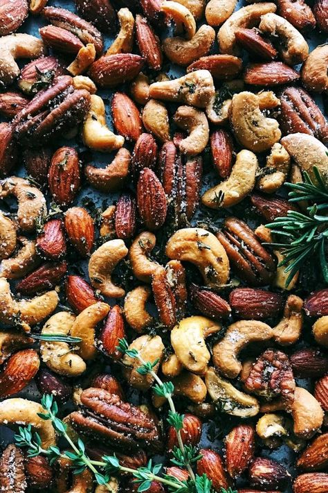 Rosemary Thyme Spiced Nuts from afarmgirlsdabbles.com - This spiced nuts recipe is so easy to make! Lightly spiced and beautifully fragrant with the earthiness of herbs, the nuts are great for nibbling and gifting. #spiced #nuts #rosemary #thyme #appetizer #gifting #foodgift #roasted Healthy Nut Mix Recipes, Nut Mix Recipe Healthy, Spiced Nuts Christmas, Spiced Mixed Nuts Recipe, Seasoned Nuts Recipe, Rosemary Recipes Vegetarian, Traeger Sides, Rosemary Pesto, Rosemary Almonds