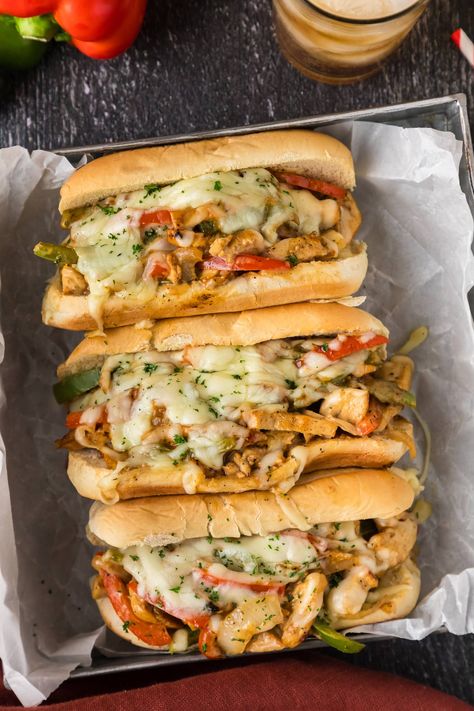 A chicken philly cheesesteak recipe loaded with sauteed bell peppers, onion, chicken, and melty cheese atop a soft hoagie bun is a lighter twist on the classic sandwich. Chicken Philly Cheesesteak Recipe, Sauteed Bell Peppers, Philly Cheesesteak Recipe, Chicken Philly Cheesesteak, Philly Sandwich, Hoagie Sandwiches, Chicken Cheesesteak, Chicken Philly, Philly Cheese Steak Recipe