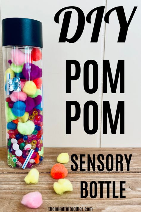 For a super easy sensory bottle recipe, try this pom pom sensory bottle! It is so bright and fun to play with and doesn't require any water or glitter! #sensoryplay #sensorybottle #toddlerfun #toddler #pompoms #pompomcrafts Pom Pom Sensory Bottle, Sensory Bottles For Toddlers, Easy Pom Pom, Sensory Play Toddlers, Sensory Bottle, Diy Pom Pom, Sensory Bottles, Sensory Development, Pom Pom Crafts