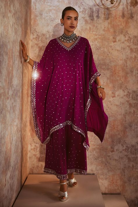 Shop for Vvani by Vani Vats Wine Georgette V Neck Embroidered Kaftan And Palazzo Set for Women Online at Aza Fashions Festive Chanderi Kaftan For Parties, Wedding Kaftan With Mirror Work, Festive Wedding Kaftan With Mirror Work, Wedding Kaftan With Gota Work For Festivals, Bollywood Style Wedding Kaftan With Gota Work, Wedding Kaftan With Gota Work For Festive Occasions, Festive Party Kaftan With Gota Work, Festive Wedding Kaftan With Gota Work, Party Kaftan With Gota Work And Traditional Drape