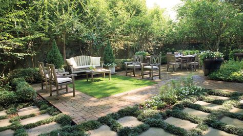 Backyard Retreat | Create a private sanctuary in your yard with inspiration from these beautiful courtyards. Patio Furniture On Grass Yards, Formal Furniture, Beautiful Courtyards, Turf Rug, Grass Patio, Monkey Grass, Large Backyard Landscaping, Grass Rug, Brick Patio