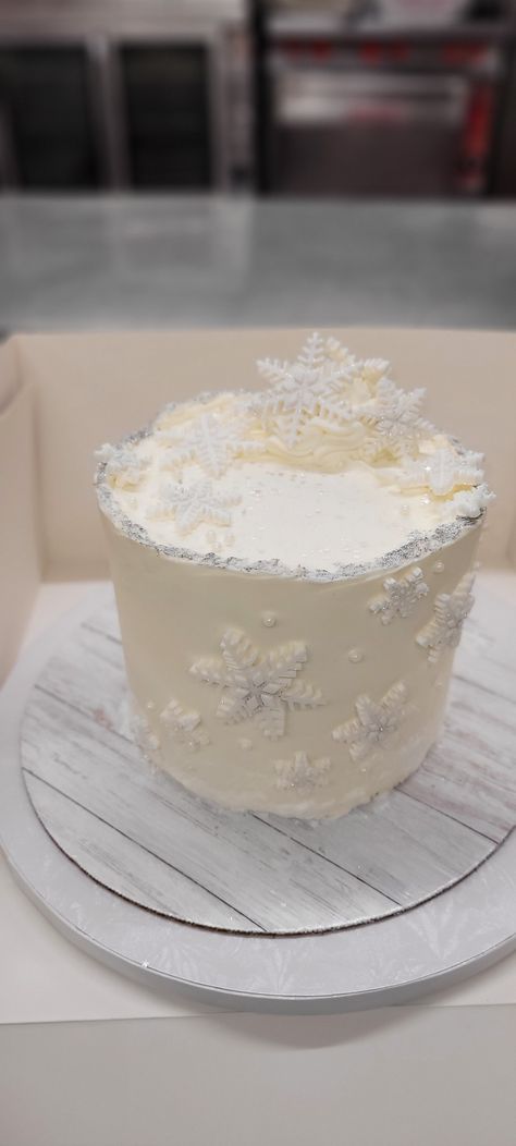 White Velvet Cake, white chocolate mousse filling, vanilla frosting, with fondant snowflakes, sugar pearls, silver tinker and luster dust Cake With Chocolate Drip, Fondant Snowflakes, White Velvet Cake, Chocolate Mousse Filling, Cake White Chocolate, White Velvet Cakes, Mousse Filling, Snowflake Cake, Cake White