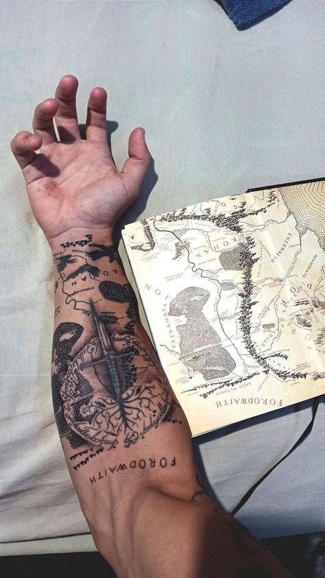 I tooked a leap of faith and used lord of the rings map, to make a "background" for my other LOTR tattoo that I did years ago. Those 3 dragons are from game of thrones, drogon, rhaegal and viserion. Lord Of The Rings Half Sleeve Tattoo, Lord Of The Rings Forearm Tattoo, Lotr Forearm Tattoo, Game Of Thrones Tattoo Sleeve, Rohan Lotr Tattoo, Survival Tattoo For Men, Lord Of The Rings Tattoo Ideas For Men, Lord Of The Rings Chest Tattoo, Lord Of The Rings Map Tattoo