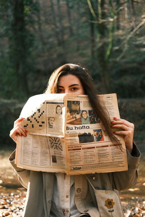 #girl #hidingface #newspaper Sherlock Photoshoot, Girl Hiding Her Face, Paris Moodboard, Paris Mood Board, Forest Stream, News Paper, Galaxy Phone Wallpaper, Girl Reading, Read News