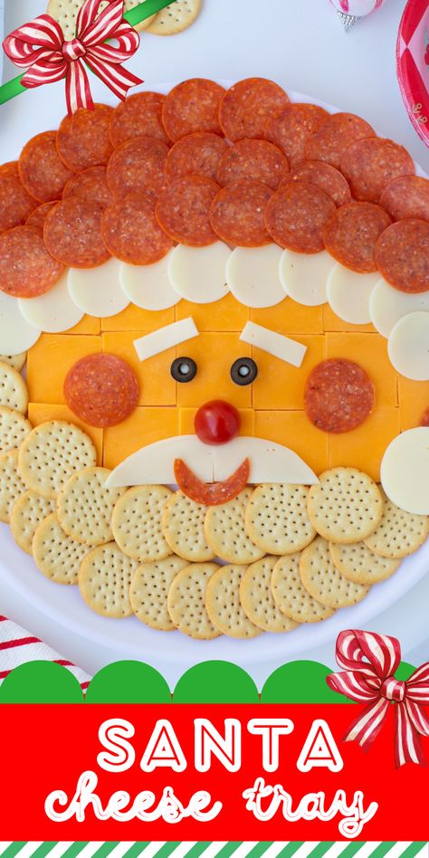 Make an adorable Santa Clause Cheese Tray with the best simple ingredients from a variety of cheeses, pepperoni and crackers. Fun Christmas idea. Santa Cheese And Cracker Tray, Santa Cheese Tray, Santa Meat And Cheese Tray, Santa Snack Tray, Pepperoni And Cheese Charcuterie Board, Meat And Cheese Tray Christmas, Candy Cane Cheese Board, Santa Cheese Platter, Pepperoni And Cheese Tray