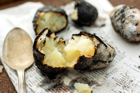 You don’t need a real recipe for these potatoes, but you do need a charcoal grill because these ash-baked tubers won’t work with gas. (Photo: Andrew Scrivani for The New York Times) Baking Potatoes, Campfire Recipes, Hot Snacks, Bad Carbohydrates, Nyt Cooking, Fire Roasted, Roasted Potatoes, Charcoal Grill, Paleo Diet