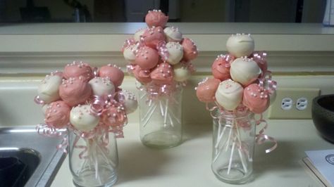 cake pop centerpieces Cake Pop Vase Display, Ballerina Cake Pops Ideas, Cake Pop Centerpiece, Ready To Pop Cake Pops, Pacifier Cake Pops, Portal Cake, Pink Cake Pops With Sprinkles, Purple Cake Pops, Graduation Cake Pops