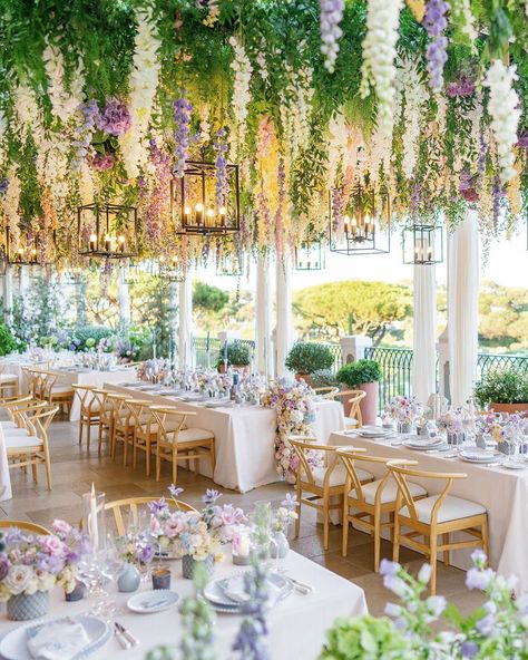 A flower covered ceiling with pastel blooms creates a romantic ambiance at this wedding reception | wedding inspo, wedding planning, wedding ideas, spring wedding, spring wedding decor, spring wedding reception, wedding reception decor, wedding reception ideas, wedding flowers, romantic wedding decor, romantic wedding, floral wedding decor, wedding flowers, wedding flower arrangements, event floral design, garden wedding, fairytale wedding, pastel wedding, 2024 wedding, wedding tablescapes Wildflower Wedding Theme, Wedding Ceiling, Dinner Setting, Indoor Wedding Receptions, Spring Garden Wedding, Garden Wedding Reception, Garden Theme Wedding, Dream Wedding Decorations, Wedding Planning Decor