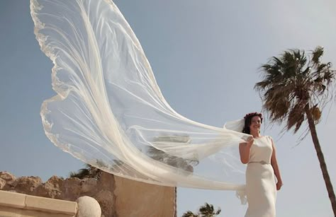 Long floaty veil that blows in the wind for a dramatic wedding photo Long Veil Wedding Photography, Dress Flowing In The Wind, Long Hair Flowing In The Wind, Flying Veil Wedding Photos, Veil Blowing In The Wind, Veil Weights, Dramatic Veil Photo, Unique Veil, Lace Drawing