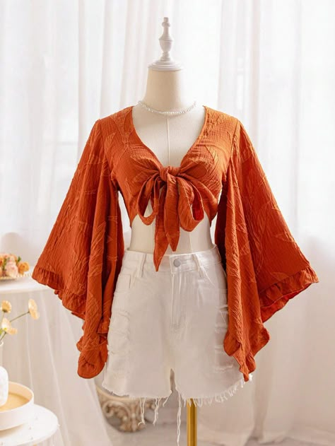 SHEIN WYWH Women's Brown Willow Texture V-Neck Tie-Front Blouse With Flared Sleeves And Ruffled Cuffs, Suitable For Vacation And Music FestivalsI discovered amazing products on SHEIN.com, come check them out! Bell Sleeve Top Outfit 70s, Feminine Long Sleeve Tops, Pirate Shirts For Women, Esentric Fashion Women, Orange Bell Sleeve Top, Boho Styles For Women, Hippy Clothes For Women, 70s Wrap Top, Sunset Aesthetic Outfits