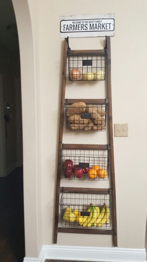 Kitchen Fruit Storage Farmhouse, Vegetable Storage Ideas Small Spaces, Wall Mounted Produce Storage, Produce Stand Kitchen, Storing Vegetables In Kitchen, Farmhouse Fruit Storage, Ladder Kitchen Decor, Wall Vegetable Storage, Fruit Stand Ideas Kitchen