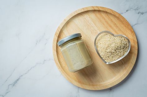 Tahini and sesame seeds on marble backgr... | Free Photo #Freepik #freephoto #tahini #sesame #sesame-seeds #mediterranean-diet Marble Background, Sesame Seeds, Alternative Medicine, Tahini, Free Photo, Free Photos, Seeds, Stock Photos