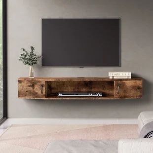 Millwood Pines Coombes Floating TV stand for TVs up to 75" | Wayfair Floating Wall Mount Tv Stand, Wall Mounted Media Console, Floating Entertainment Center, Wood Media Console, Under Tv, Console Shelf, Tv Wand, Floating Tv Stand, Floating Tv