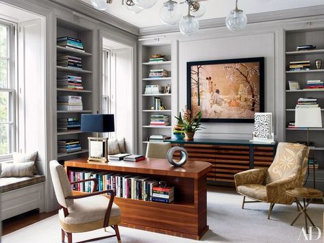 A Sandy Skoglund photograph is mounted over the library’s custom-made rosewood-and-walnut credenza. Shawn Henderson, Manhattan Townhouse, New York Townhouse, Old Greenwich, Mosaic House, Contemporary Room, Hall Design, Teak Furniture, Home Library